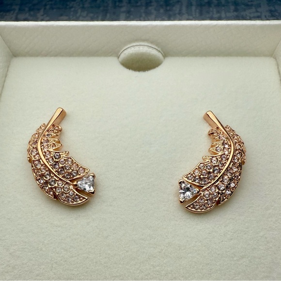 Swarovski Jewelry - NWT Swarovski Nice Stud Feather Earrings